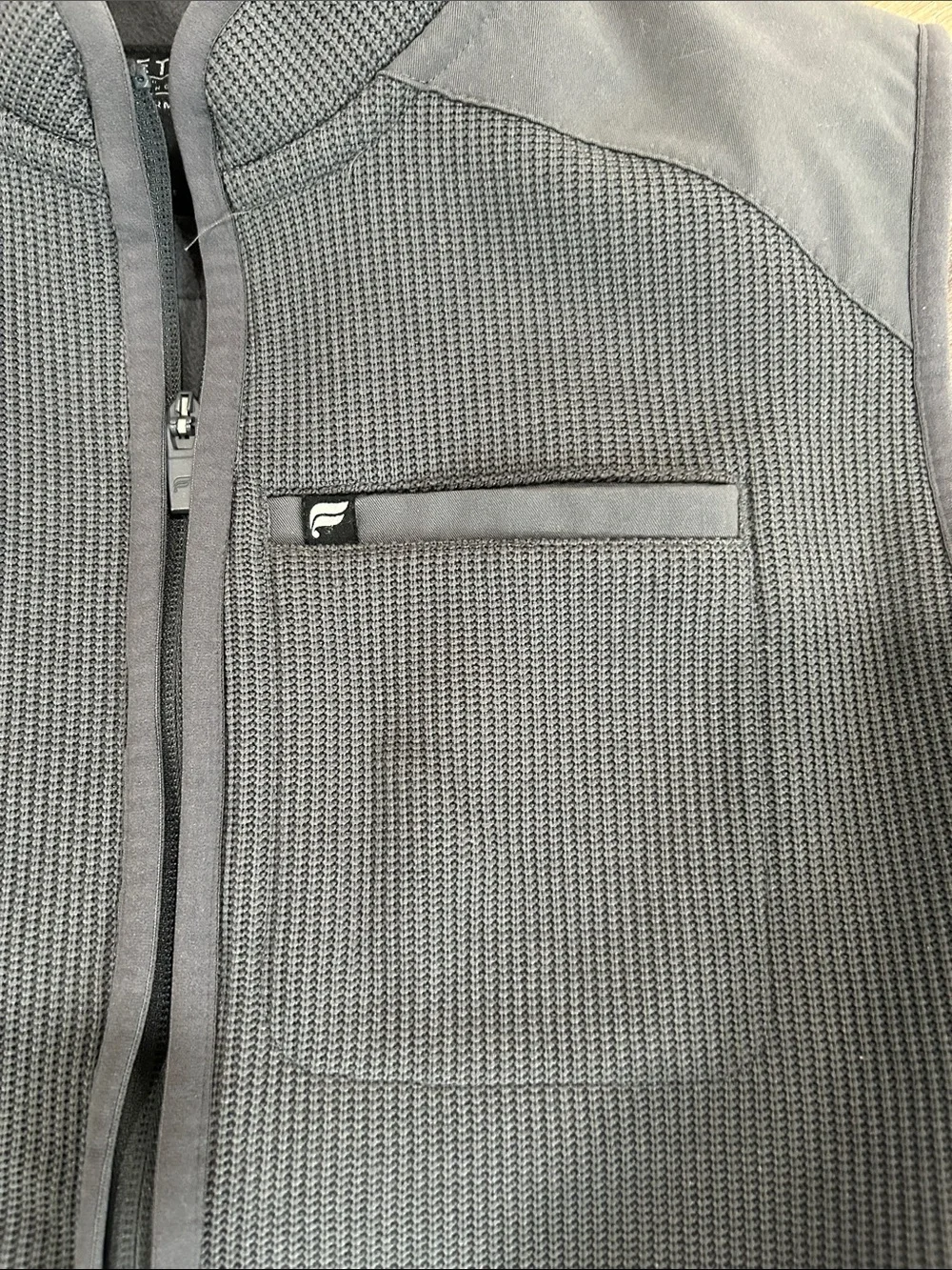 Fabletics men’s gray vest feel good performance, large zip pockets
